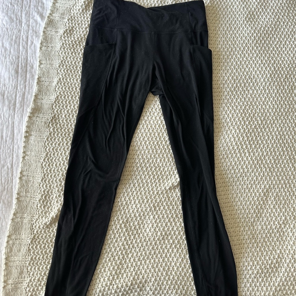 Athleta stash pocket salutation tights